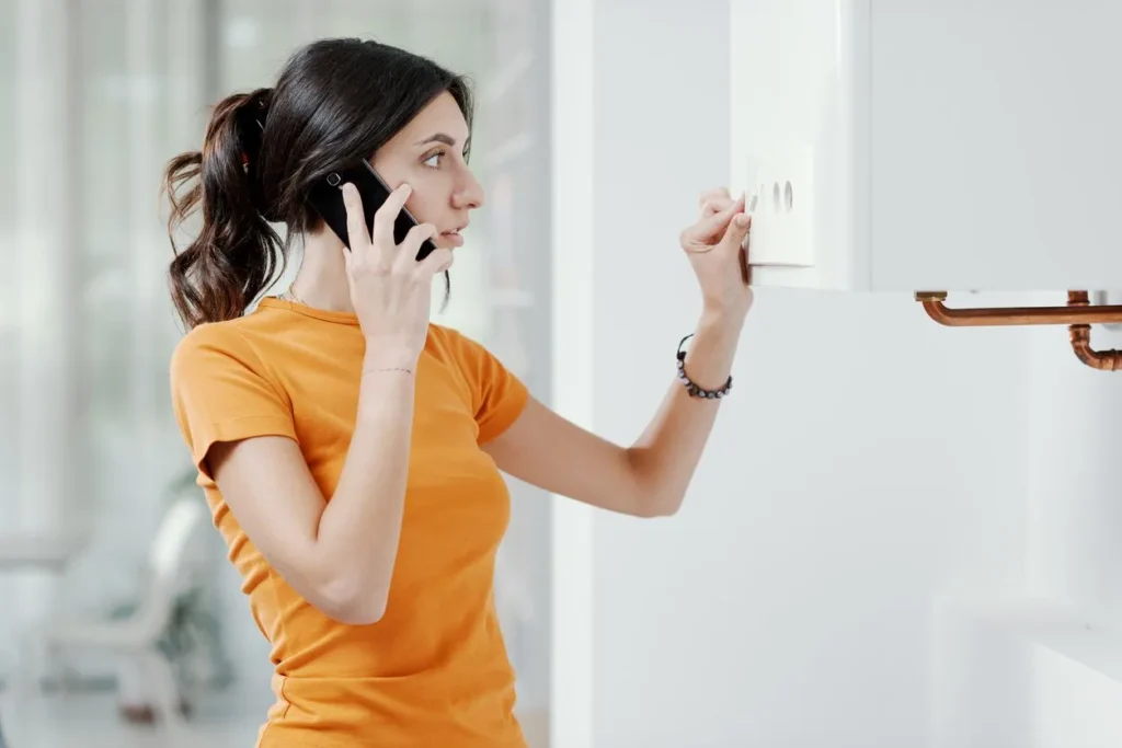 Woman checking furnace
